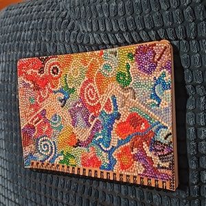 Handcrafted beaded notebook. No two are alike. Pages blank, unlined.